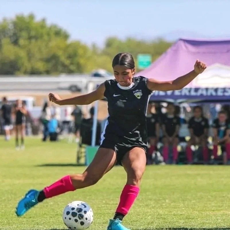 Ali Rogers on the ball for Beach FC